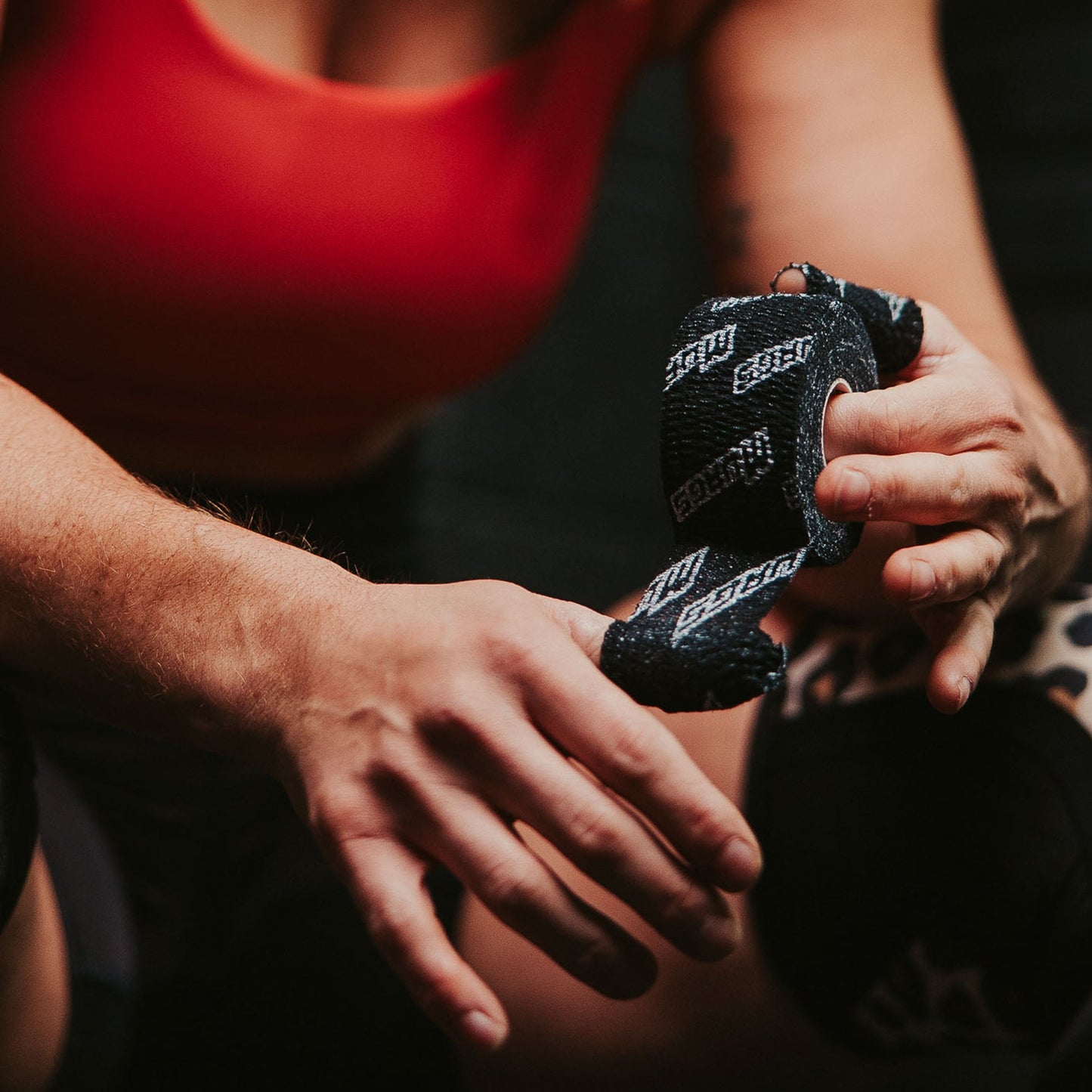 Murgs Weightlifting thumb tape ULTRA being applied to thumbs